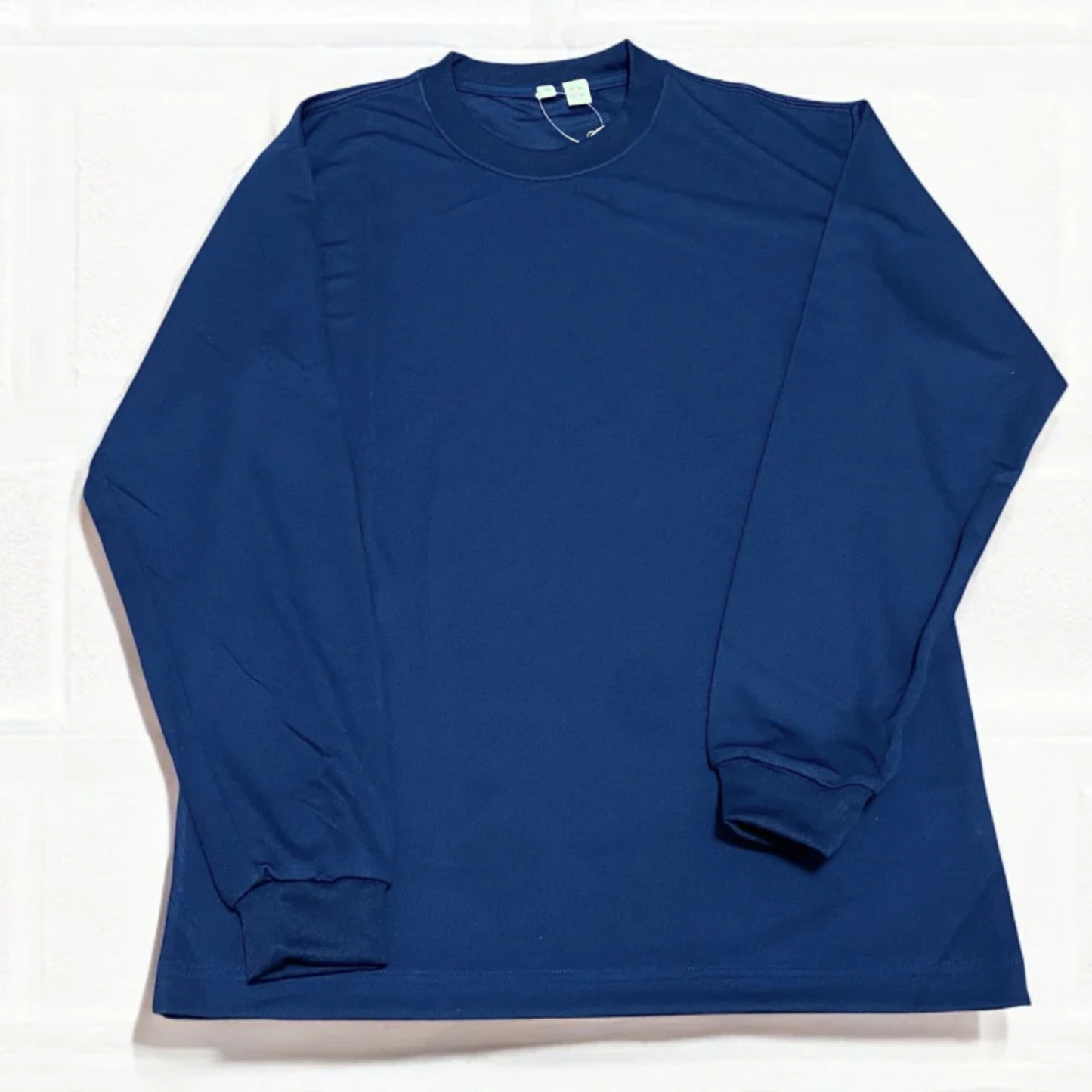 汗をかいてもベチャつきにくい吸水速乾長袖Tシャツ